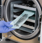 54947526 - sterilizing medical instruments in autoclave